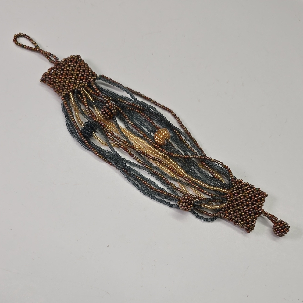 Elegant Beaded Bracelet in Brown and Gold